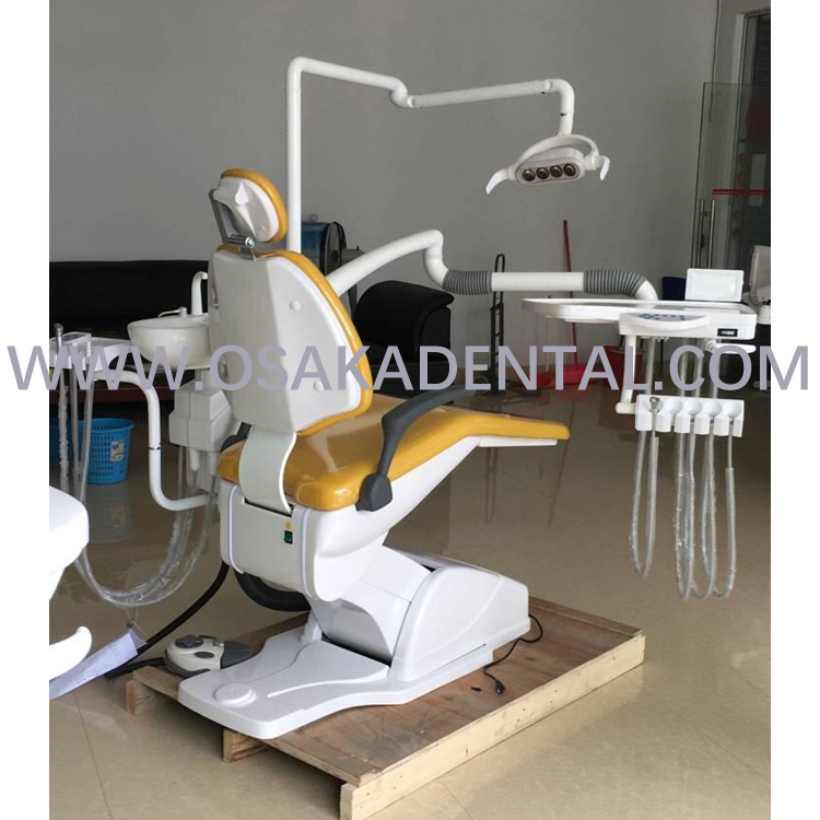 Dental chair with dental stool with orange colour leather