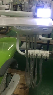Dental chair with air compressor with curing trolly