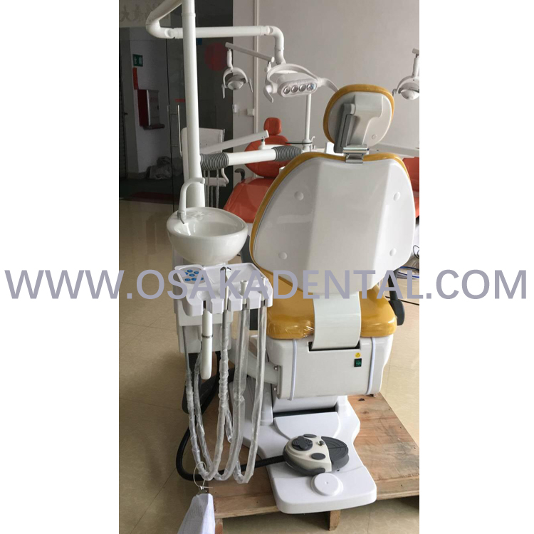 Dental chair with dental stool with orange colour leather