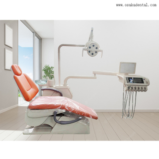 High quality dental chair with orange colour and one dentist stool