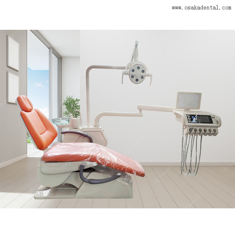 High quality dental chair with orange colour and one dentist stool