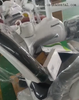 Adjustable LED dental chair with anti-microbial upholstery for clinical hygiene