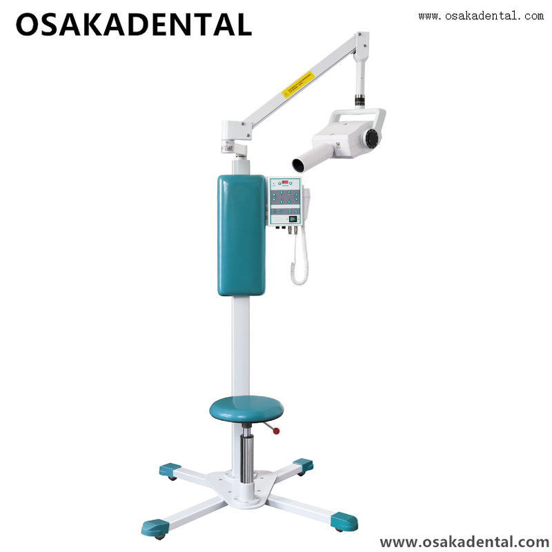 Pink colour dental chair with standing X ray machine
