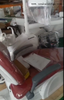 Adjustable LED dental chair with anti-microbial upholstery for clinical hygiene