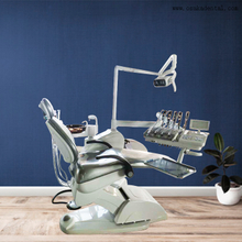 Dental chair with LED lamp with top mounted tray 