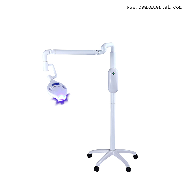 Dental chair with dental bleaching machine