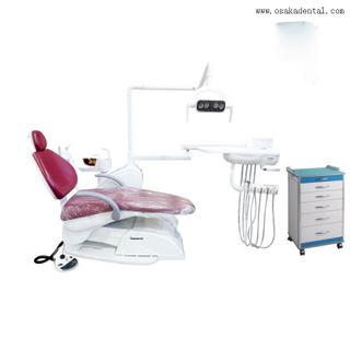 Red color dental chair with dental cabinet for dental clinic
