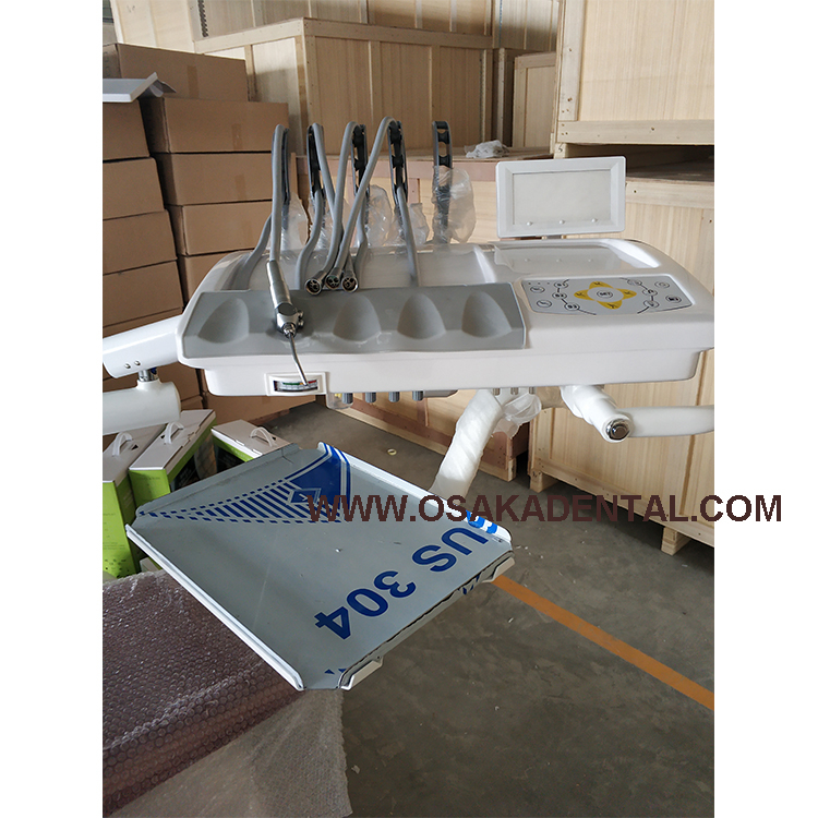 Dental chair with top mounted Red color