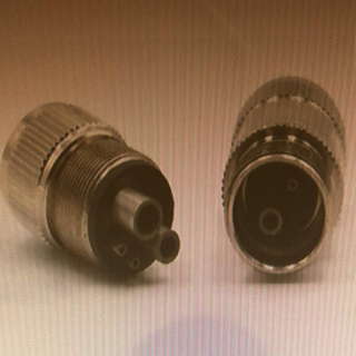 A Dental Handpiece Adapter 4 hole to 2 hole
