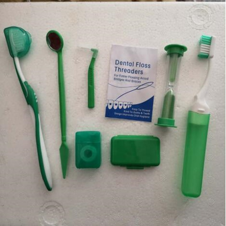 A Dental Orthodontic Kit with Brush and Mirror