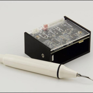 A Built in Dental Scaler with Handpiece for Dental Unit